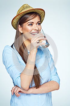Smiling woman drink water. Isolated portrait.