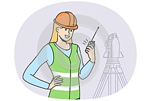 Smiling woman engineer work with geodetic equipment