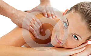 Smiling woman enjoying a massage