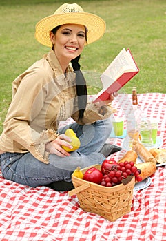 Smiling Woman Enjoying Summer Picnic