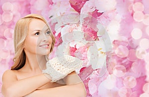 Smiling woman with exfoliation glove