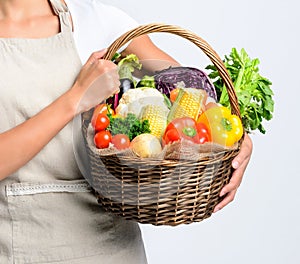 Smiling woman with fresh produce