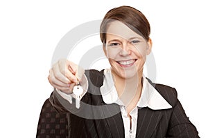 Smiling woman gives over house key