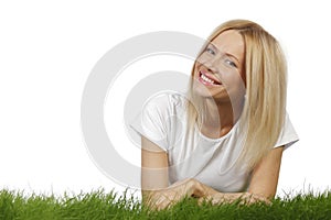 Smiling woman on grass