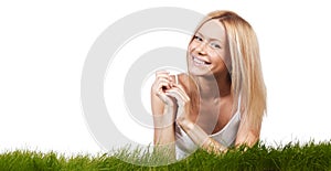 Smiling woman on grass