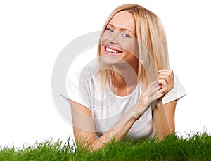 Smiling woman on grass