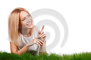 Smiling woman on grass