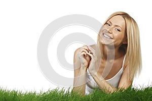 Smiling woman on grass