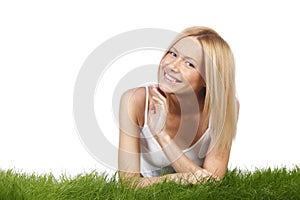 Smiling woman on grass