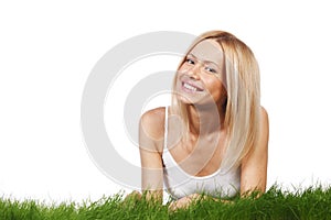 Smiling woman on grass