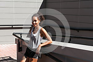 Smiling woman have a break during training