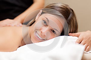 Smiling woman having a massage