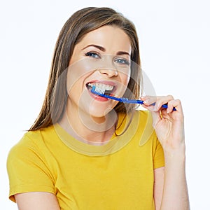 Smiling woman with healthy teeth holding toothy brush