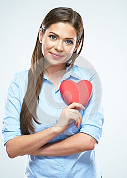 Smiling woman heart hold. White background