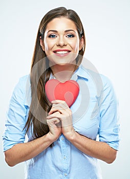 Smiling woman heart hold. White background