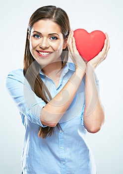 Smiling woman heart hold. White background