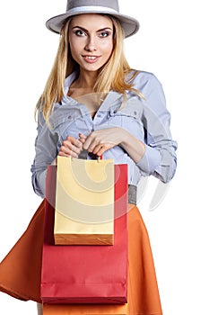 Smiling woman hold shopping bag.