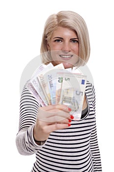 Smiling woman holding a handful of Euro notes