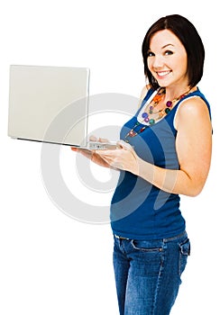 Smiling woman holding laptop