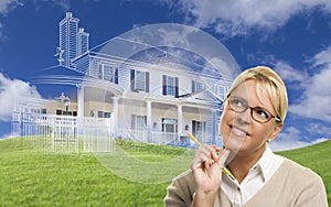 Smiling Woman Holding Pencil Looking to Ghosted House Drawing Be