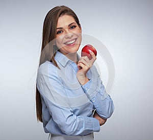 Smiling woman holding red apple