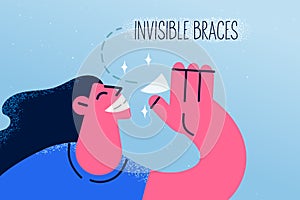 Smiling woman with invisible braces system