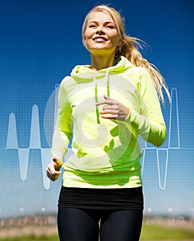 Smiling woman jogging outdoors