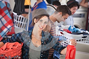 Smiling Woman In Laundromat photo