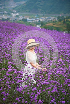 Smiling woman in lavender field