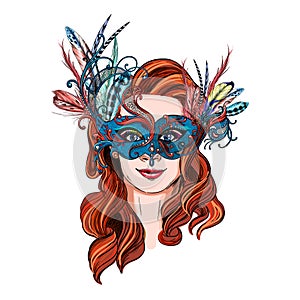 Smiling woman in luxury carnival mask and feathers