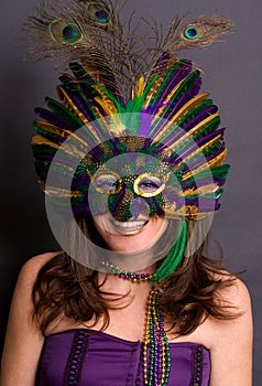 Smiling Woman in Mardi Gras Mask