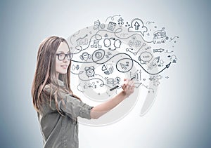 Smiling woman with a marker, business plan