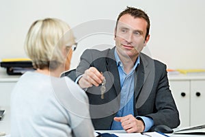 Smiling woman meeting with realtor