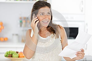 smiling woman on phone at home