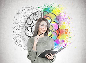 Smiling woman with a planner, brain