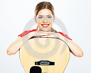 Smiling woman portrait with acoustic guitar . white background