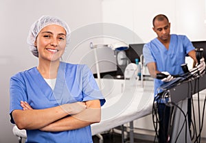 Smiling woman professional beautician in aesthetic cosmetology office