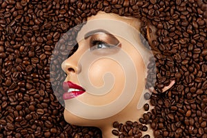 Smiling woman profile face in coffee beans