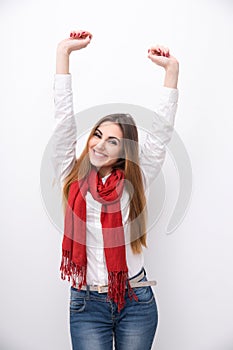 Smiling woman with raised hands up