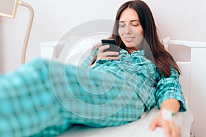 Smiling Woman Receiving Treatment in a Hospital