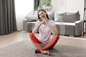 Smiling woman resting during sport