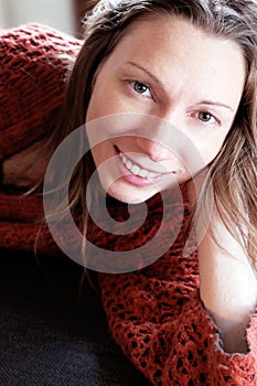 relaxing woman Smiling at home on a sofa holidays no stress
