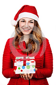 Smiling woman in santa helper hat with many gift boxes