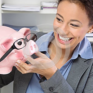 Smiling woman with savings