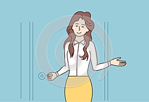A smiling woman secretary opens the door and invites visitors inside the office. The girl invites to visit a cafe or restaurant.