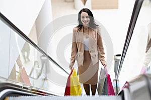 Smiling woman in shopping center