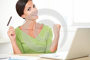 Smiling woman shopping on the internet