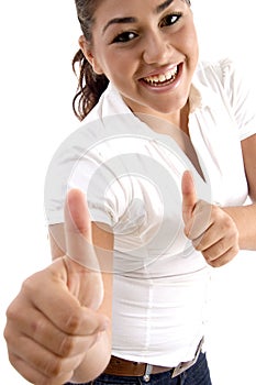 Smiling woman showing good luck sign