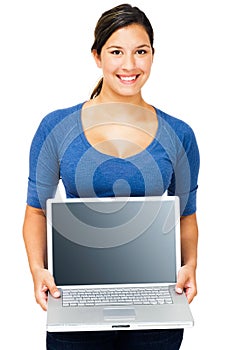 Smiling woman showing laptop