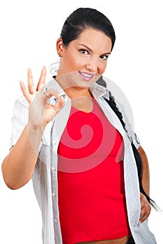 Smiling woman showing okay sign hand